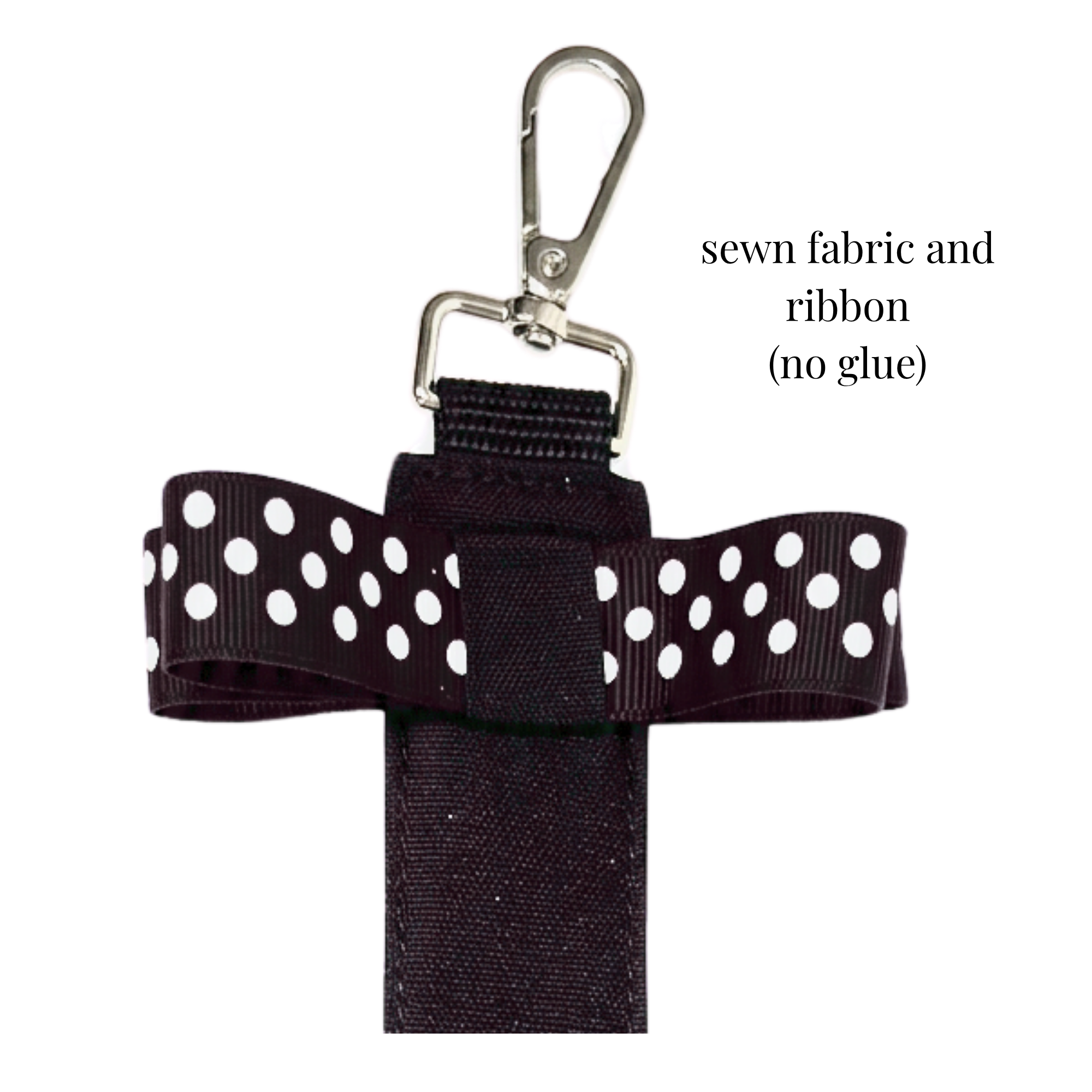 Black sewn fabric ribbon pin with white polka dots and metal clip for cheer bag or uniform accessory.