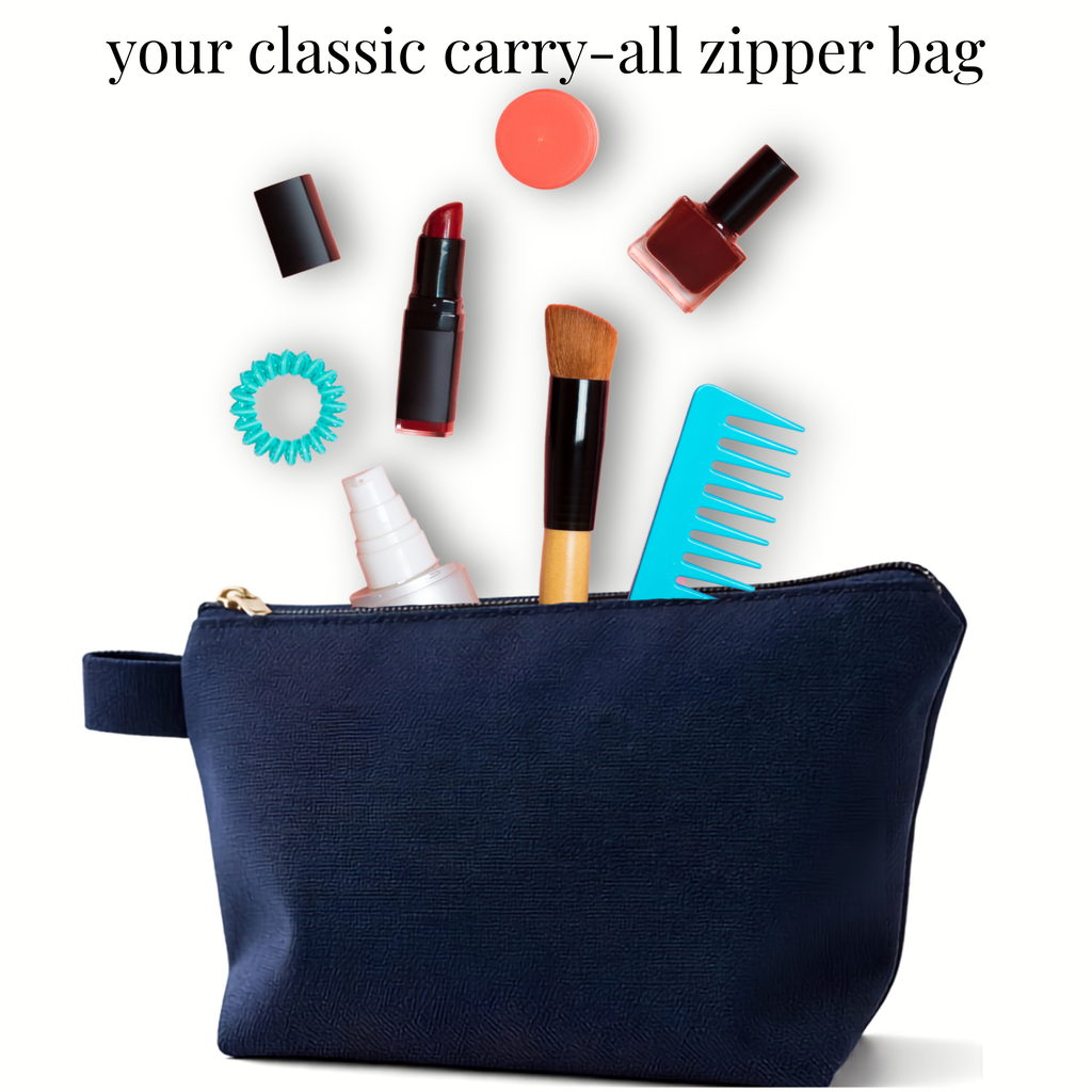 Navy blue classic carry-all zipper bag holding cheer and skate makeup essentials with brush, comb, lipstick, and nail polish.