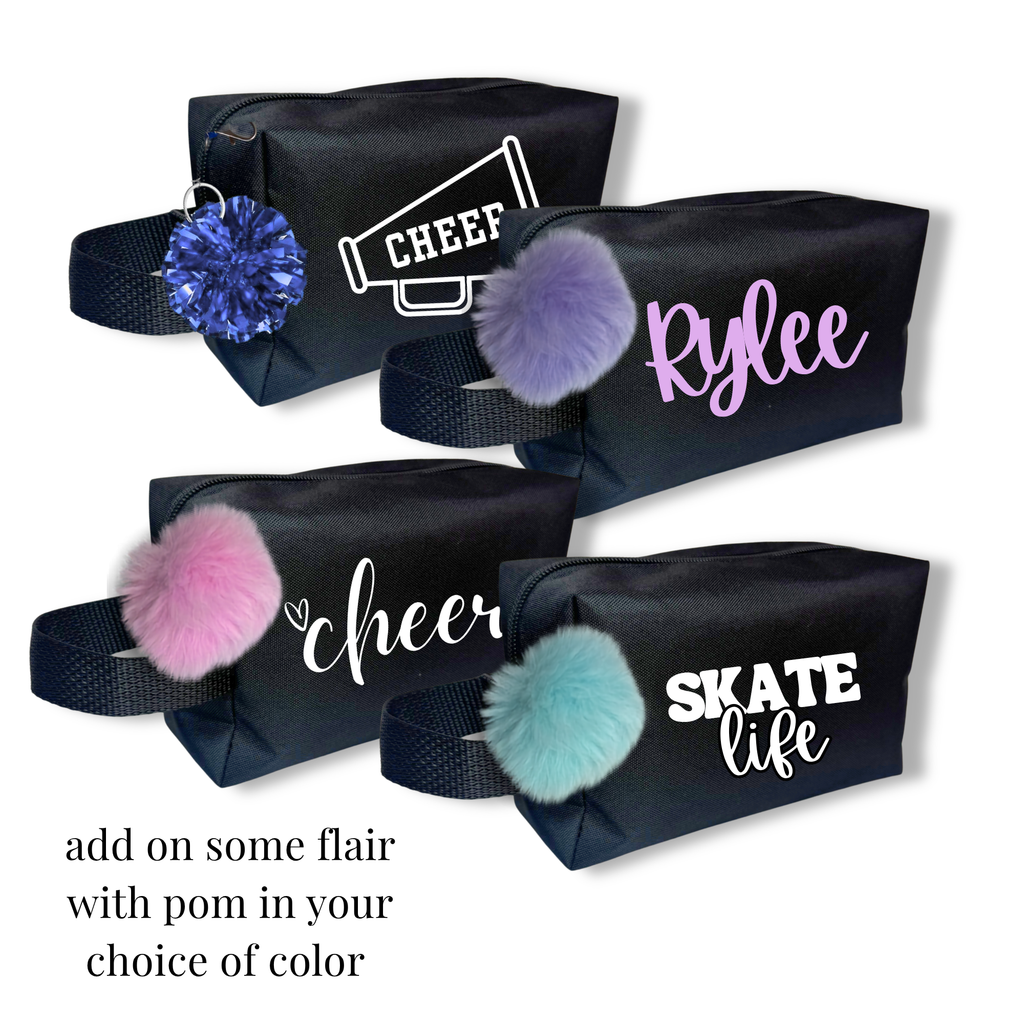 Four black rectangular competition bags with sturdy handles, each customized with sporty text like "CHEER," "Rylee,".