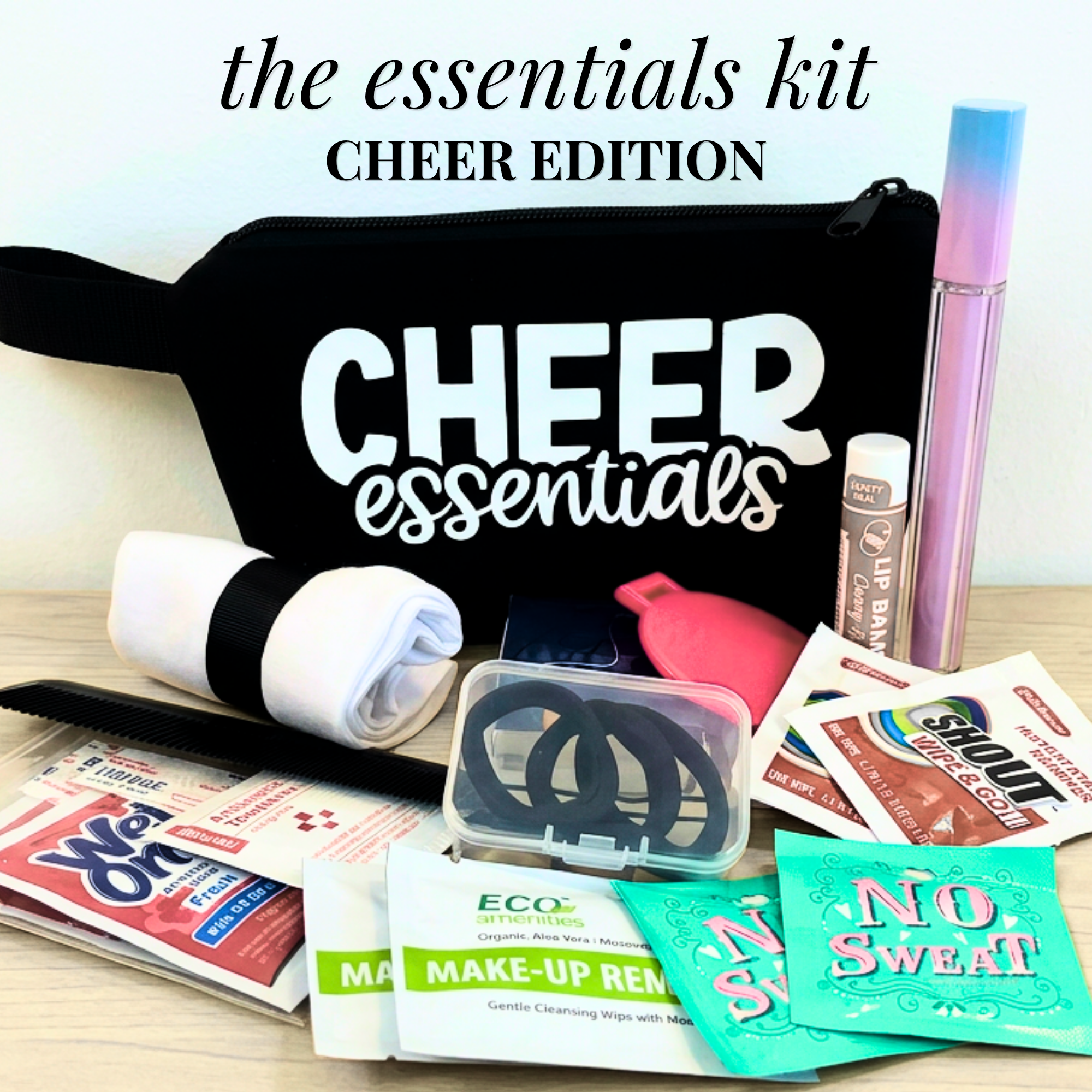 Black zippered cheer essentials bag with white text, containing lip gloss, gum, no sweat wipes, hair ties, and makeup.