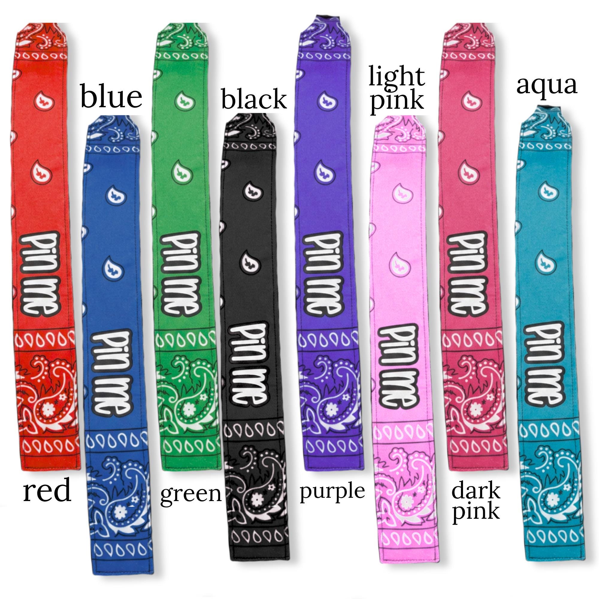 Set of colorful cotton bandanas in red, blue, green, black, purple, light pink, and aqua, each with white paisley patterns.
