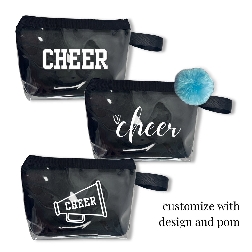 Three clear black cheer bags with white designs, including text and a megaphone, one decorated with a blue pom pom attached.