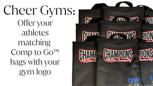 Black rectangular Comp to Go™ team bag with red and white "Champions" logo, designed for cheer and skate uniforms and.