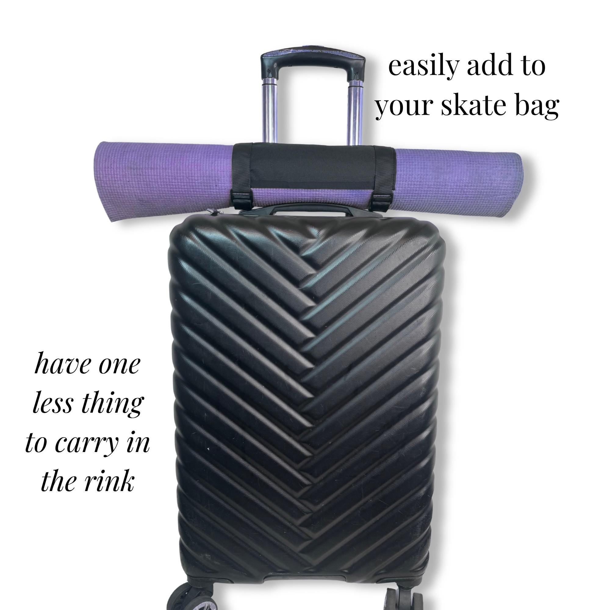 Black textured hard-shell suitcase with a purple yoga mat secured on top, ideal for skate competition or cheer uniform.