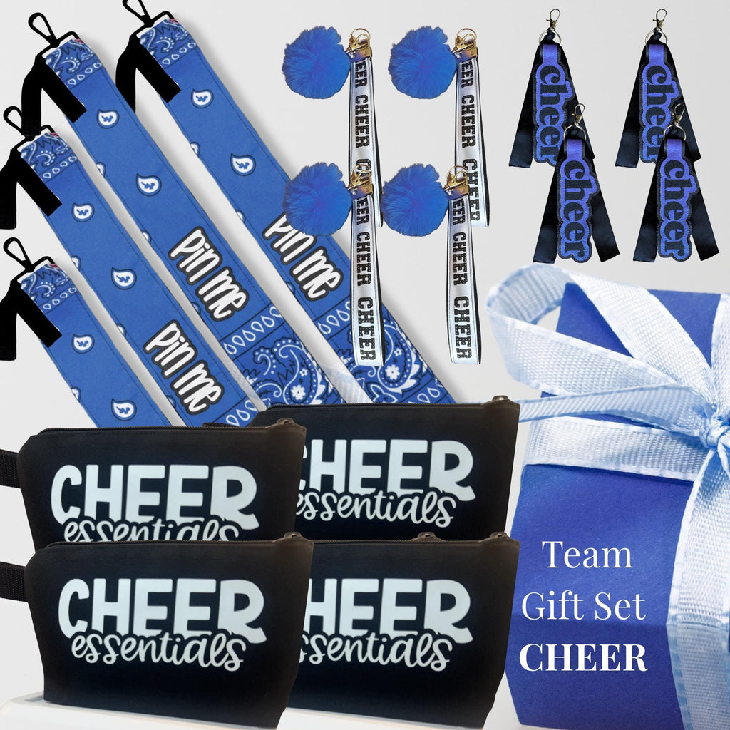 Blue and black cheer gift set with wristlets, cheer-themed keychains, and black pouches labeled "CHEER essentials".